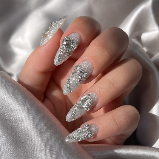 Model wearing silver glitter crystal bridal press-on nails