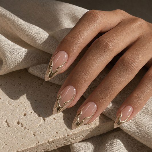 Model wearing nude molten gold press-on nails